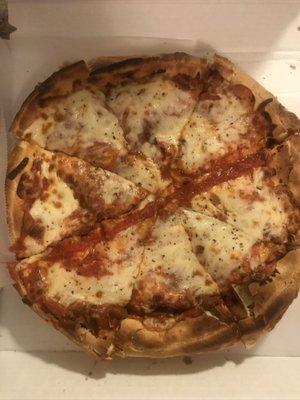 Pizza deep dish with extra cheese and sausage!