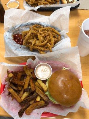 Cheeseburger fries and onion rings.