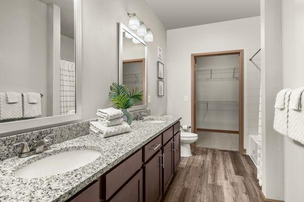 Bathroom with double vanities at Estates of Richardson