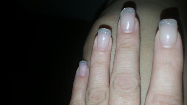 3 days after getting done not happy at all asked if the guy doing my nails if he had glitter powder didn't understand