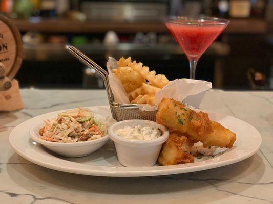 PORTUGUESE BEER BATTERED FISH & CHIPS super bock battered Atlantic cod, waffle fries, cabbage, and apple slaw served with a remoulade sauce