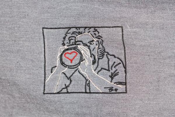 Embroidered version of hand drawn picture on scarf