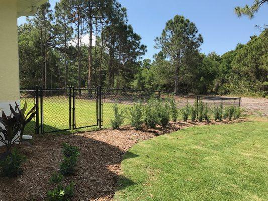 Black vinyl coated chain link fence