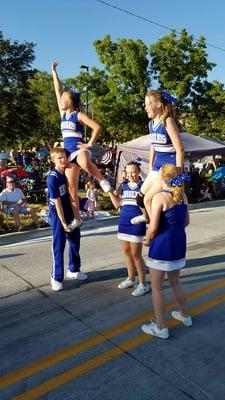 The cheerleaders were full of energy and made a lot of noise!