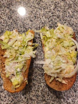 Wheat bun with lettuce and mayo. Where is the meat.