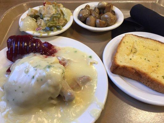 Turkey & dressing, garlic bread, mushrooms and green bean casserole.