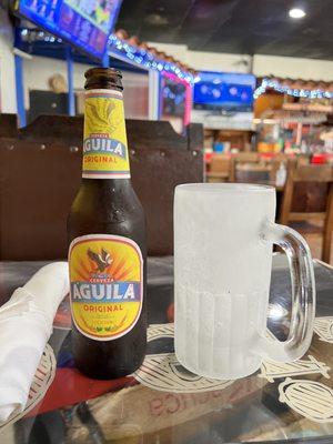 Culled Águila Beer and glass