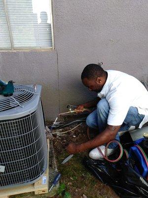 Soldering high & lower lines for A/C unit.