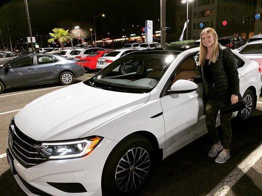 Our girl with her beautiful new Jetta!