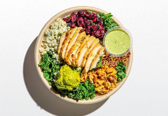 Kalling it Kale | roasted chicken, kale, quinoa, avocado, blue cheese, dried cranberry, walnuts | dressing: creamy pesto