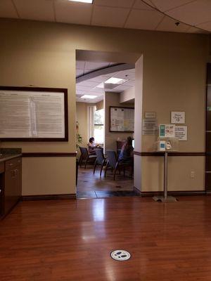 Patients getting checked in their admission.