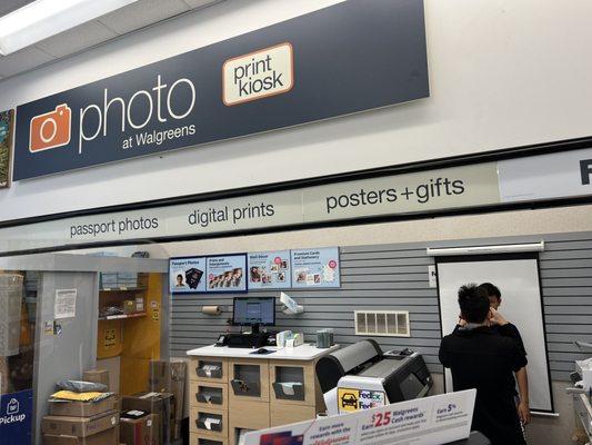 Passport photo in progress as the photo center