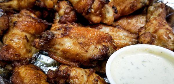 My new favorite: PLAIN wings, (request that they be) "well done" with jalapeno ranch dipping sauce.  Trust me, you'll be glad you did.