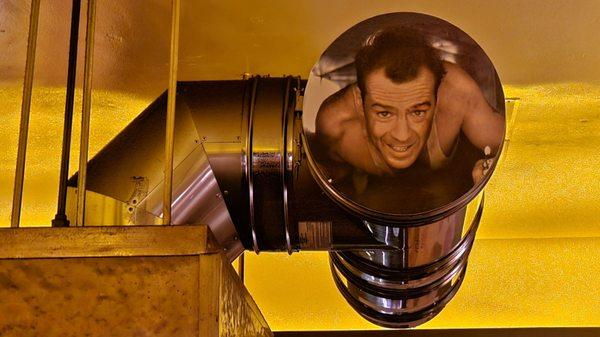 John McClane says Yipee Ki-yay from the vent