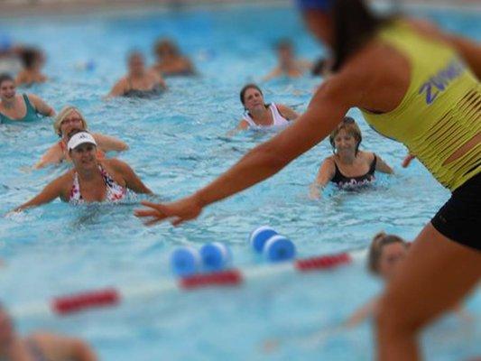 Aqua Zumba combines the South American Zumba rhythm and dance steps with a pool party.