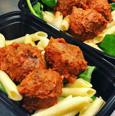 Meatball Marinara consisting of lean ground turkey, gluten free penne pasta, and fresh spinach.