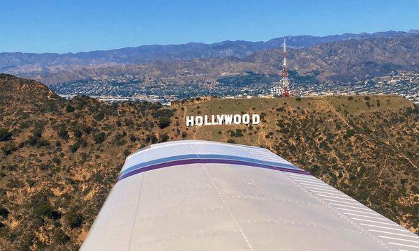 Passing by the Hollywood sign while flying in the tour