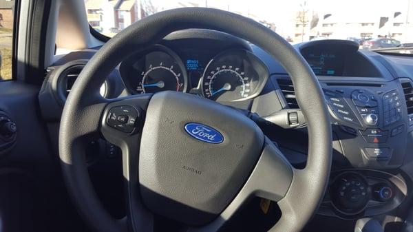 2016 Ford Fiesta. Fascinating wheel and gauges.