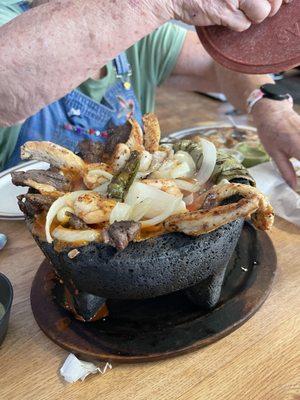 We have eaten a lot of Mexican food BUT this place has been the best by far. Three of us split the Molcajete it is over-the-top delicious .