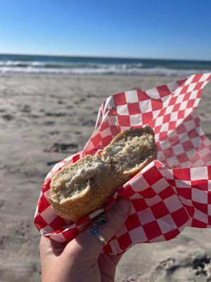 Sesame seed bagel with plain cream cheese