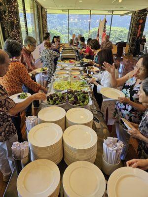 The buffet line starts with clean plates