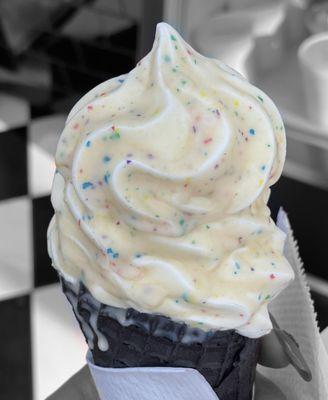 Black cone with vanilla custard dipped in cake batter!