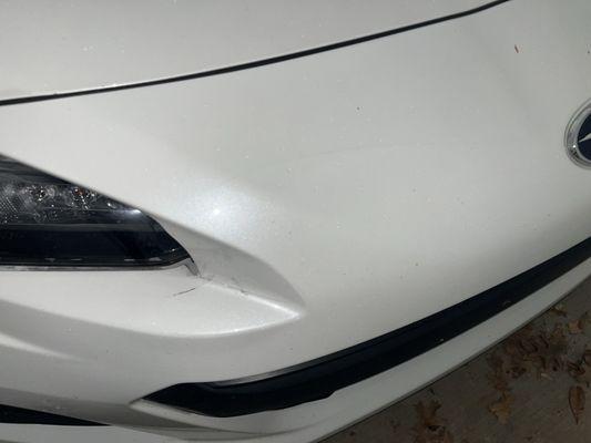 Front bumper damage prior to repair