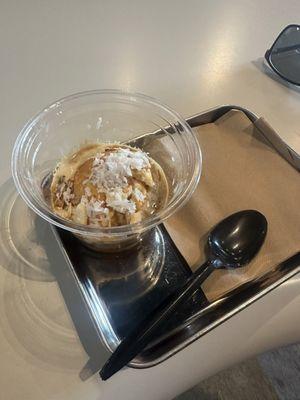 Affrigato ice cream with coconut shavings and almond slivers yummmmo