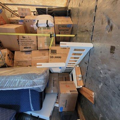 Tidal wave of unsecured load coming down on fragile items