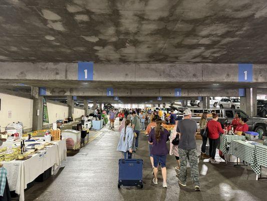 It's inside the Galvez Garage today due to weather, but it is going on!