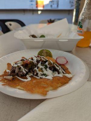 My third taco  look how they cook their flour tortillas. And the Flaco meat, aka shredded beef, is super fire.