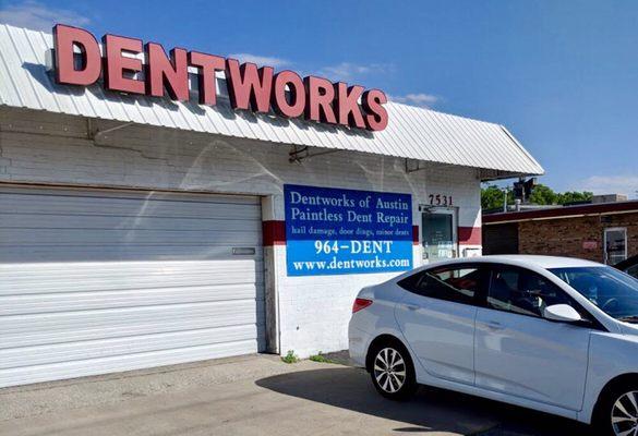 Efficient little workshop where they perform their dent removal miracles.