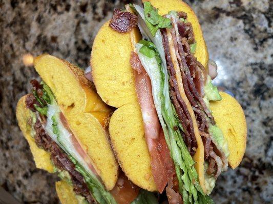 BLT with avocado on an egg bagel