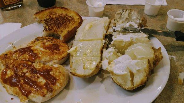 grilled chicken breast dinner with some deelishis Heinz 57 slathered on top. baked tater butter and sour cream garlic toast and a diet Pepsi