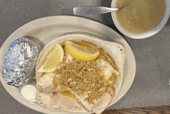 Baked haddock with baked potato and apple sauce