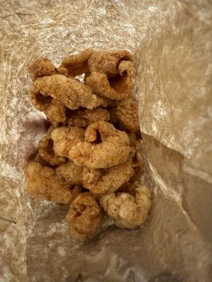 Pork rinds are cheap and good.