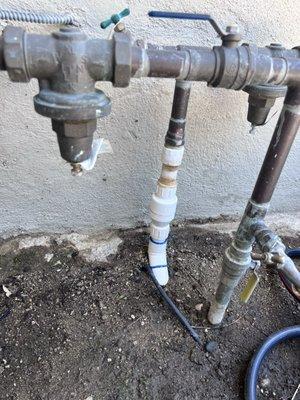 Before ... cracked and leaking back flow with pvc pipes