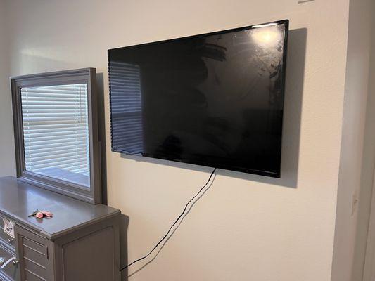 TV mounted to wall