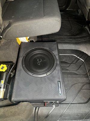 Sub under the back rear seat