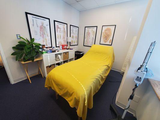 Tranquil treatment rooms with soft music and dim lighting aid in healing