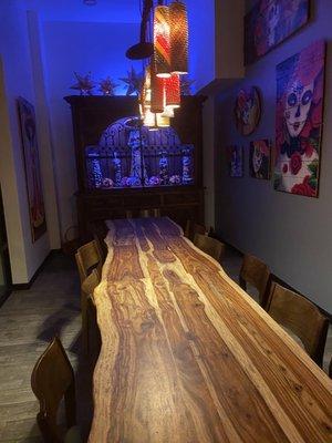 Beautiful wood table down a quiet dining section.