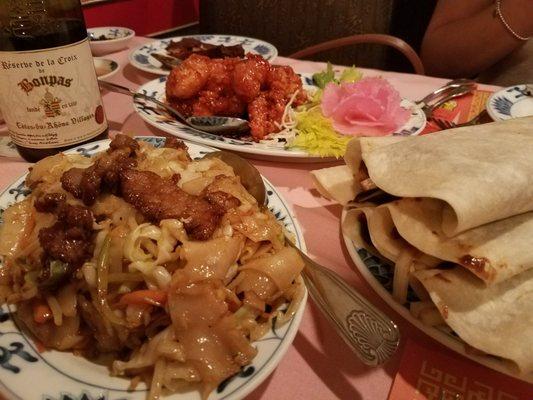 Beef Chow Fun (lower left)  Sesame Chicken (upper left) Hand-rolled Peaking Duck (Right)  BYOB