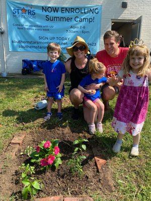 Stars students working on their family plot in our community garden