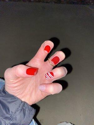 "Candy-Cane Christmas Nails