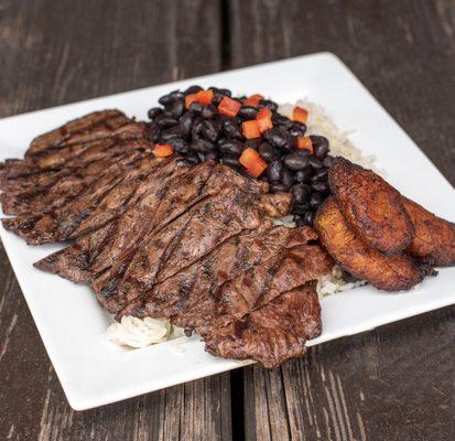 Churrasco with rice, beans and plantains