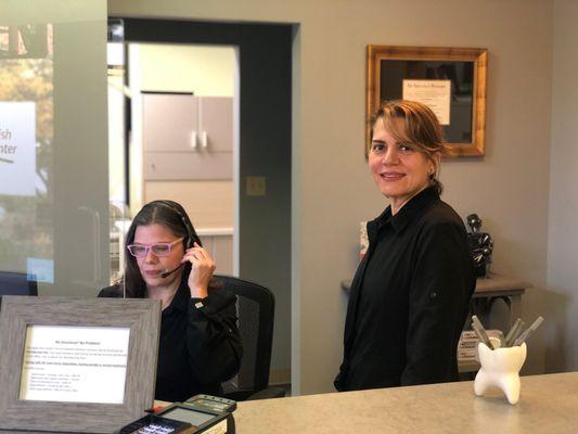 Dr. Goharkhay at the front desk with her office manager, Vanessa