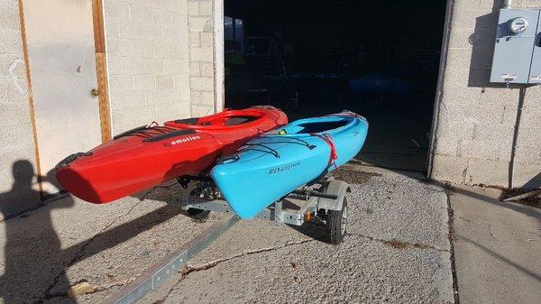 Yep Sit-in kayaks on a Malone transport trailer