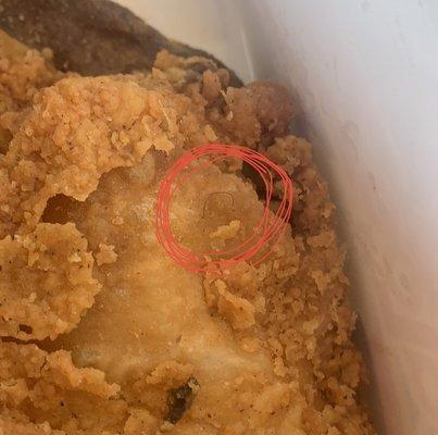 Pubic hair in my chicken.