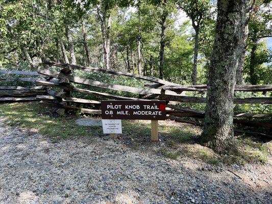 At the top, a separate trail wraps around the rocky outcropping