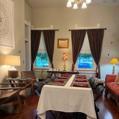 Study converted into a breakfast room to accommodate a full occupancy.